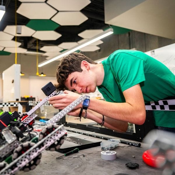 Student working with robotics