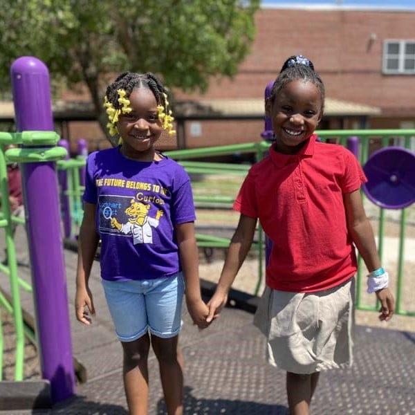 Students on playground at Lockhart Elementary Magnet