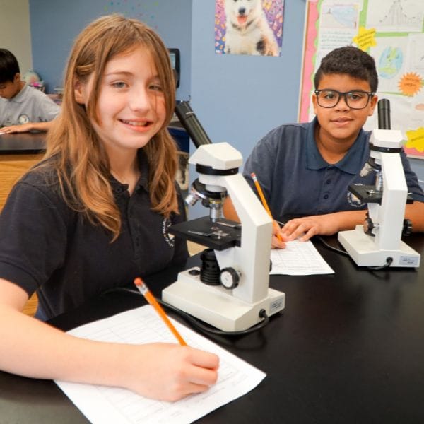 Two students in science class