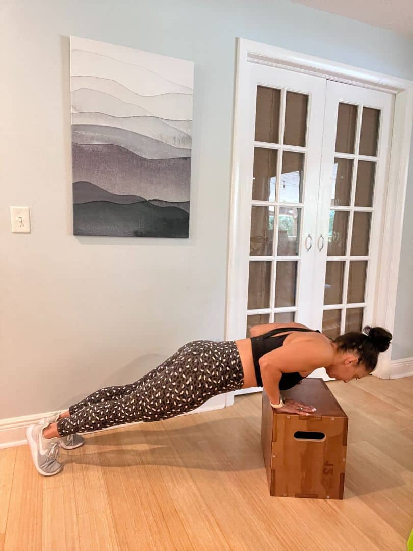Alayna Curry demonstrates a pushup chest Exercise 