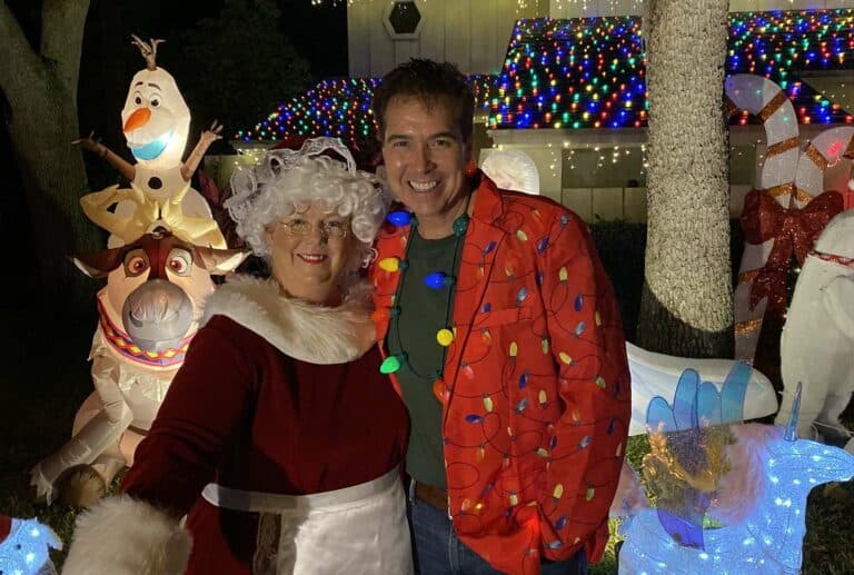 Local meteorologist Denis Phillips celebrates the holiday season with Christmas cheer and cocoa for a cause