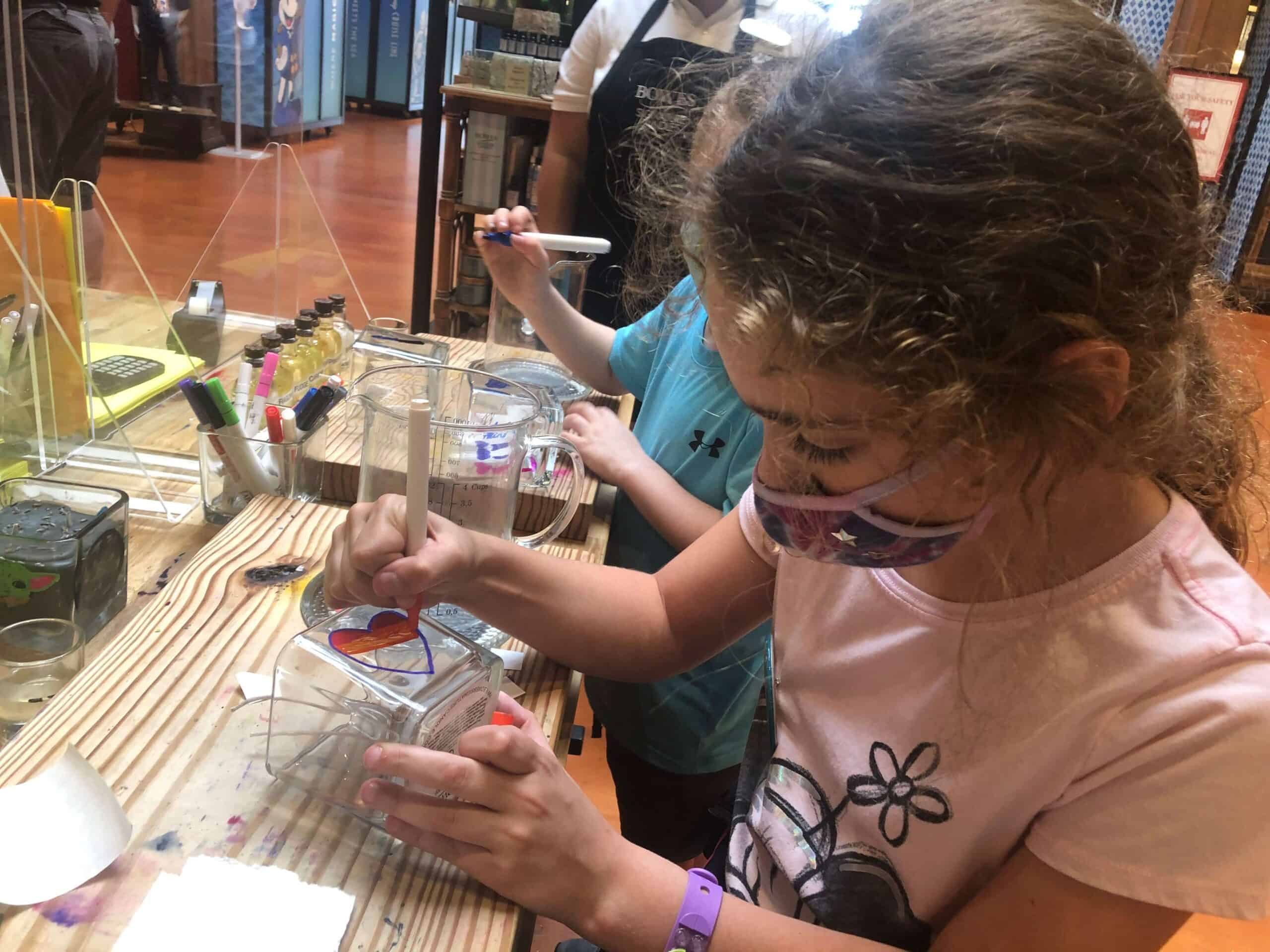 https://tampabayparenting.com/wp-content/uploads/2022/11/Make-your-own-candle-at-Disney-Springs-Michelle-Spitzer-scaled.jpg