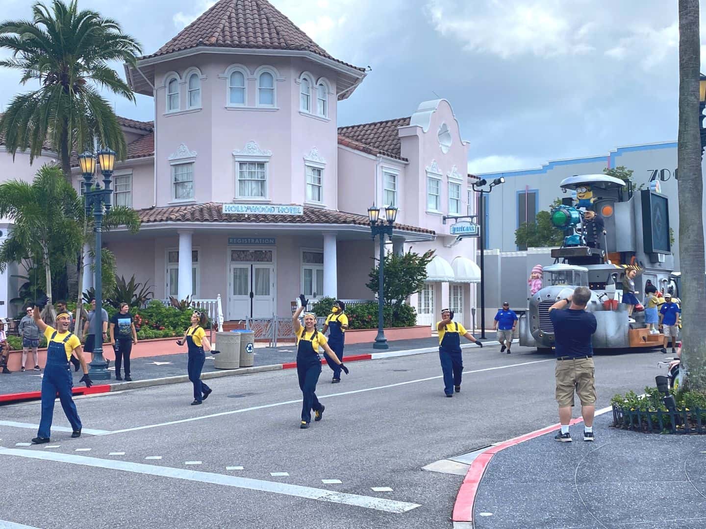Minions Character Party Zone at Universal Studios Florida with performers dressed as Minions and a Despicable Me parade float