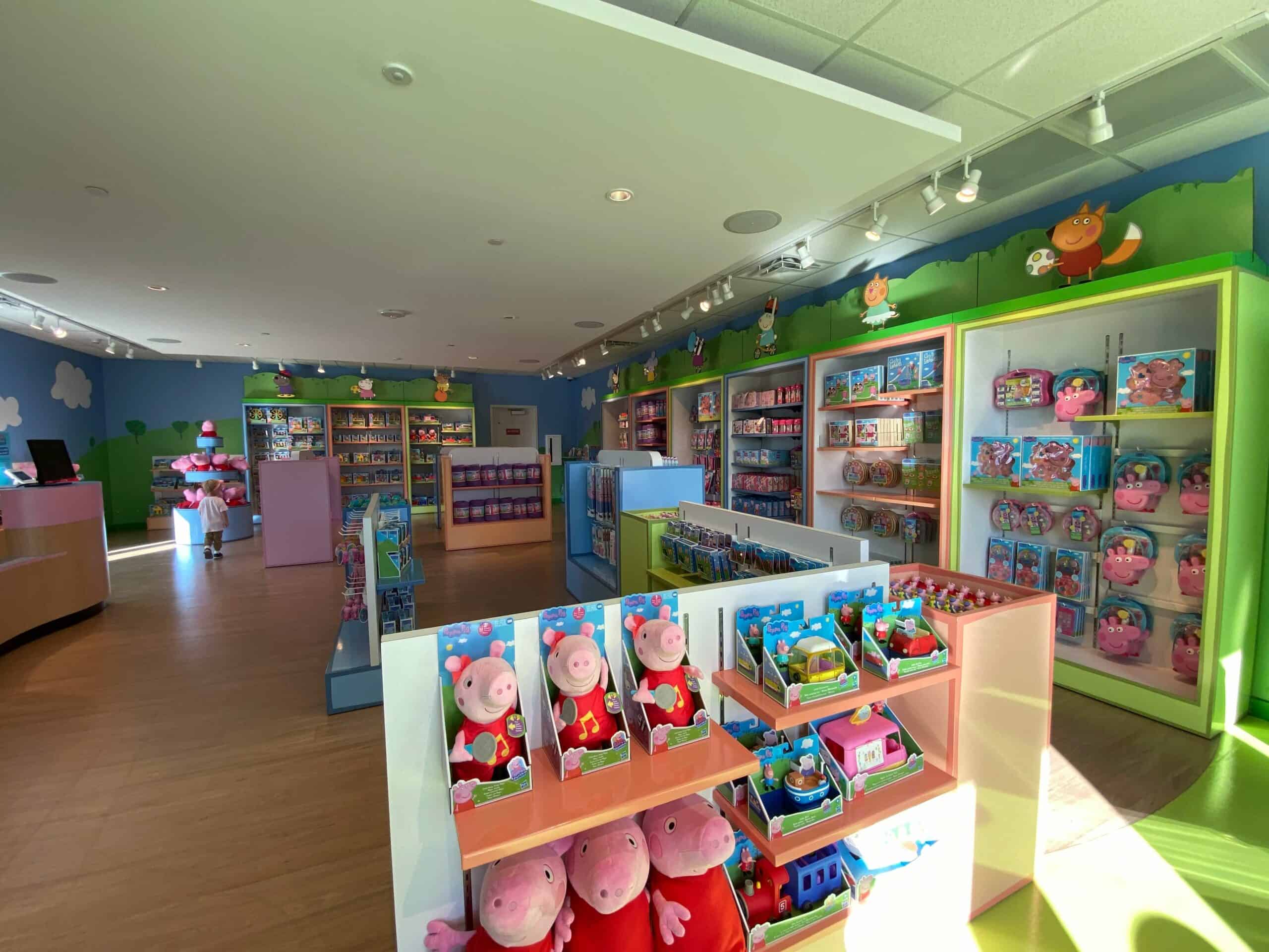 Peppa Pig merchandise lines the shelves of Mr. Fox's Shop at Peppa Pig Theme Park Florida