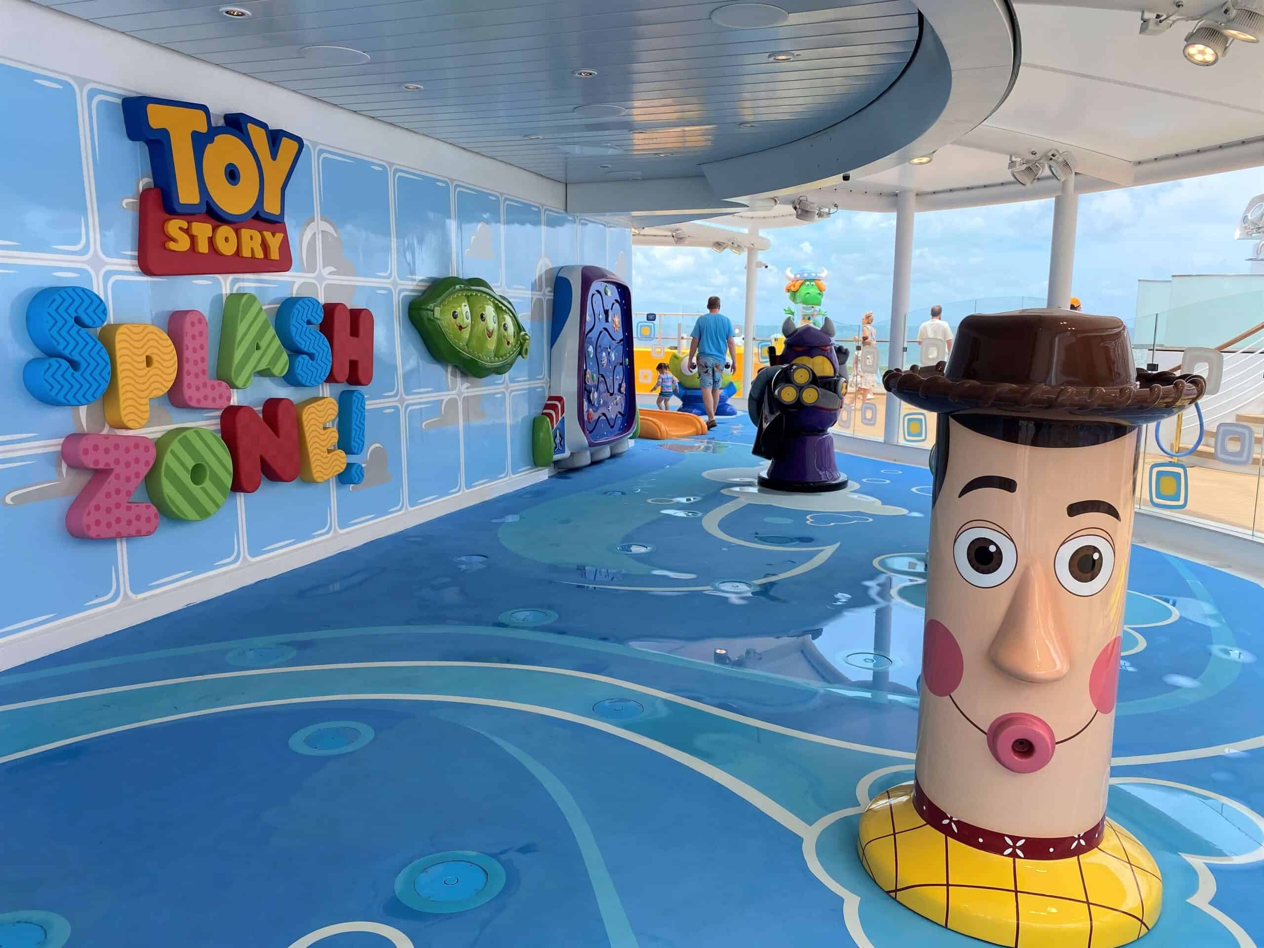 Toy Story Splash Zone on Disney Wish with Woody character in foreground and Zurg character behind