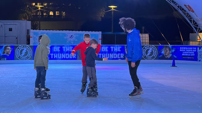 Kids Ice Skating at Winter Village