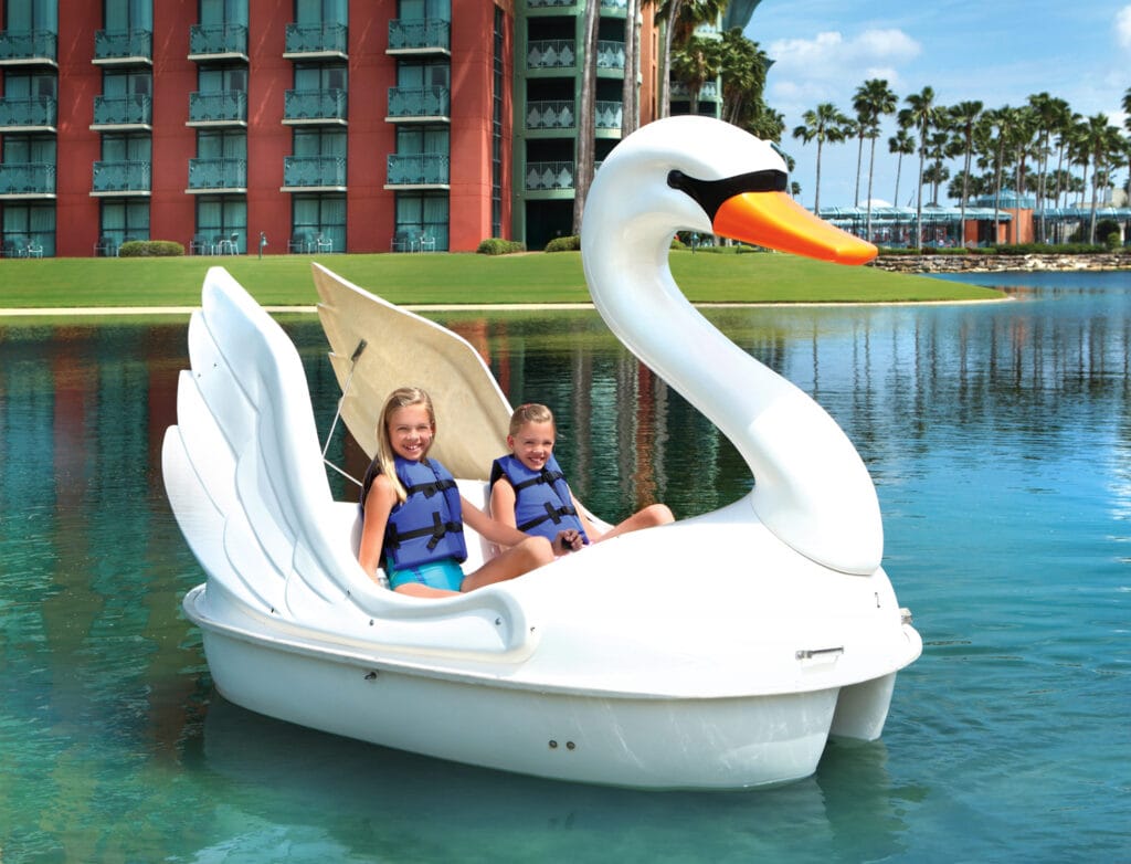 Kids in Swan boat at Swan and Dolphin Best resorts in Florida for families