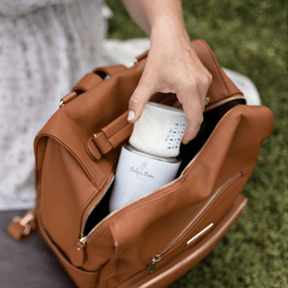 you can pop the Baby's Brew Bottle Warmer 3.0 right into your purse