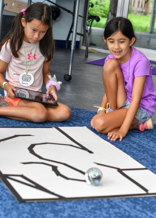 half-day camps at Corbett Prep campers with robots
