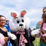 Easter Bunny with two mothers and their kids