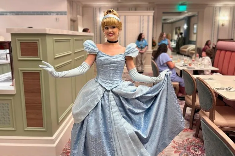 Cinderella poses for a picture at 1900 Park Fare Character Dinner