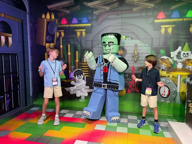 Kids dancing with LEGO Monster Rocker at Brick or Treat Florida.