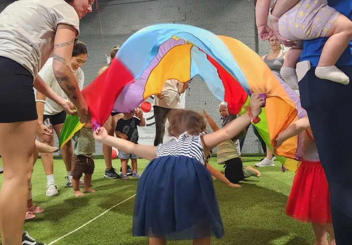 toddlers love Parachute time at The Rock Gym Open Play