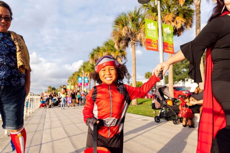 Friends of Riverwalk Trick-or-treater smiling
