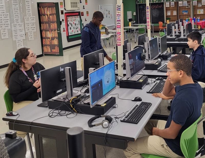 IB Middle School students on computers