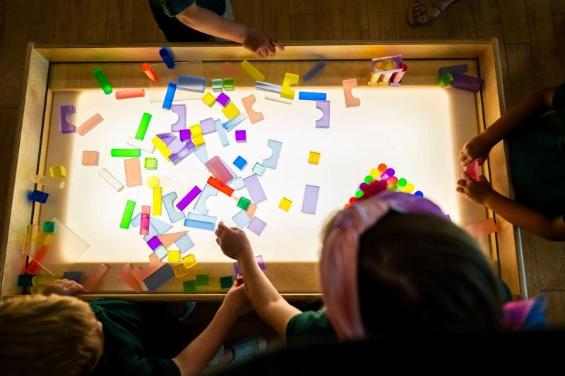 St. Pete STEAMfest kids playing with light table