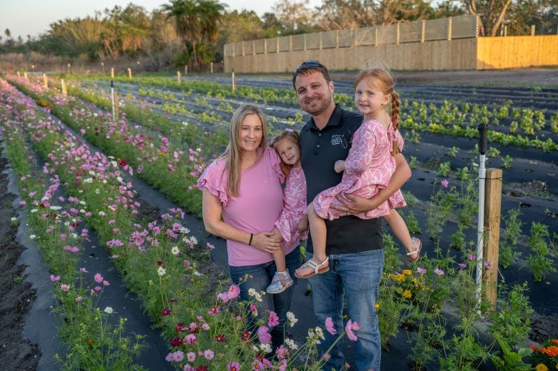 Ananda Farm Hinkle Family in flower field