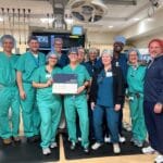 Doctors showing the certificate for the all-new game-changing infant cardiac stent