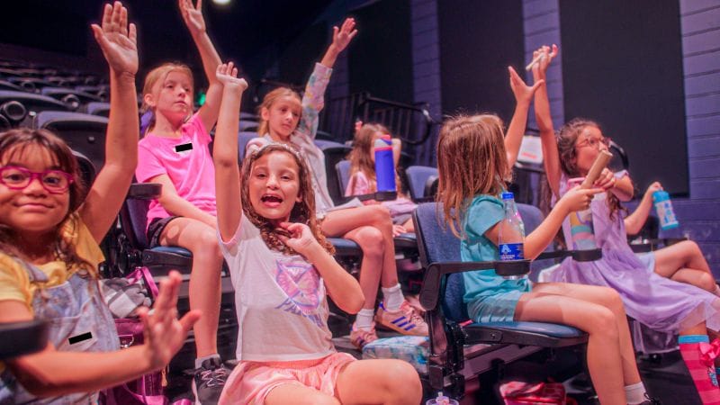 summer campers in the stands at Ruth Eckerd Hall's Marcia P. Hoffman School of the Arts 