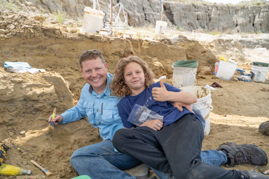 Grayson with his son Merritt at the dig site with PaleoAdventures.