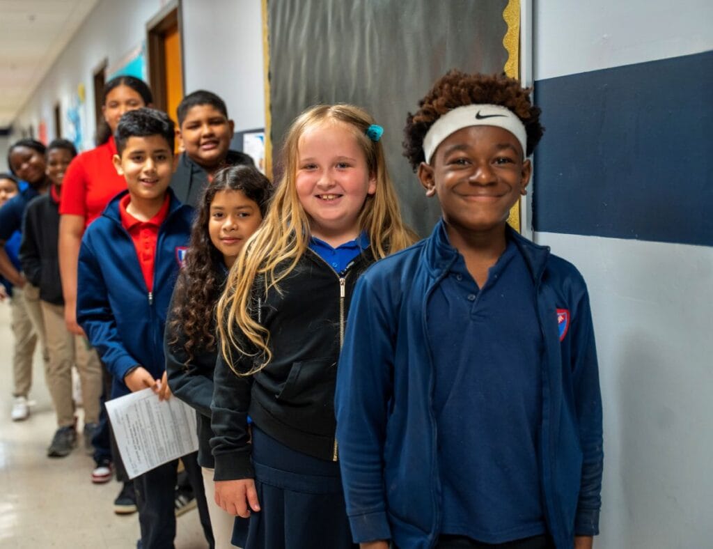 Excelsior Prep & Woodmont Charter Schools students in hallway