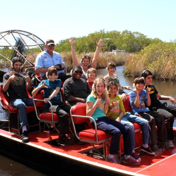 Students in a fan boat