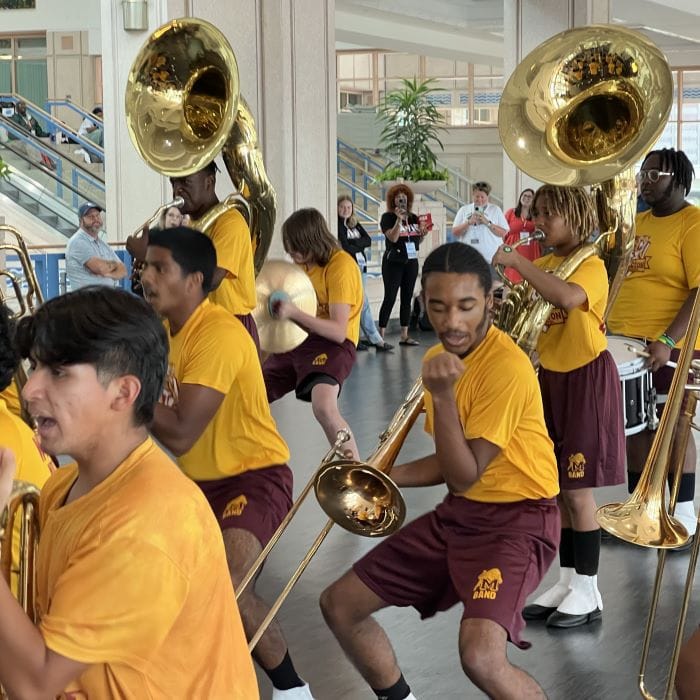 Students performing in marching band