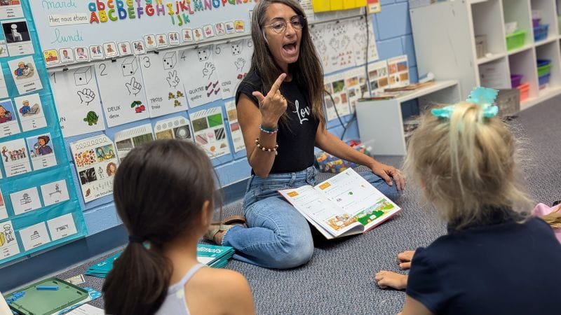 Teacher going over the French language with students