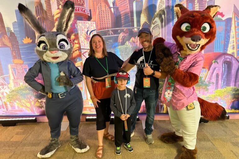 Editor Dani Meyering and family pose with characters from Zootopia Better Zoogether at Animal Kingdom - image from Dani Meyering