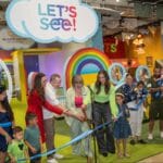 Let's See exhibit ribbon cutting Glazer family legacy of giving