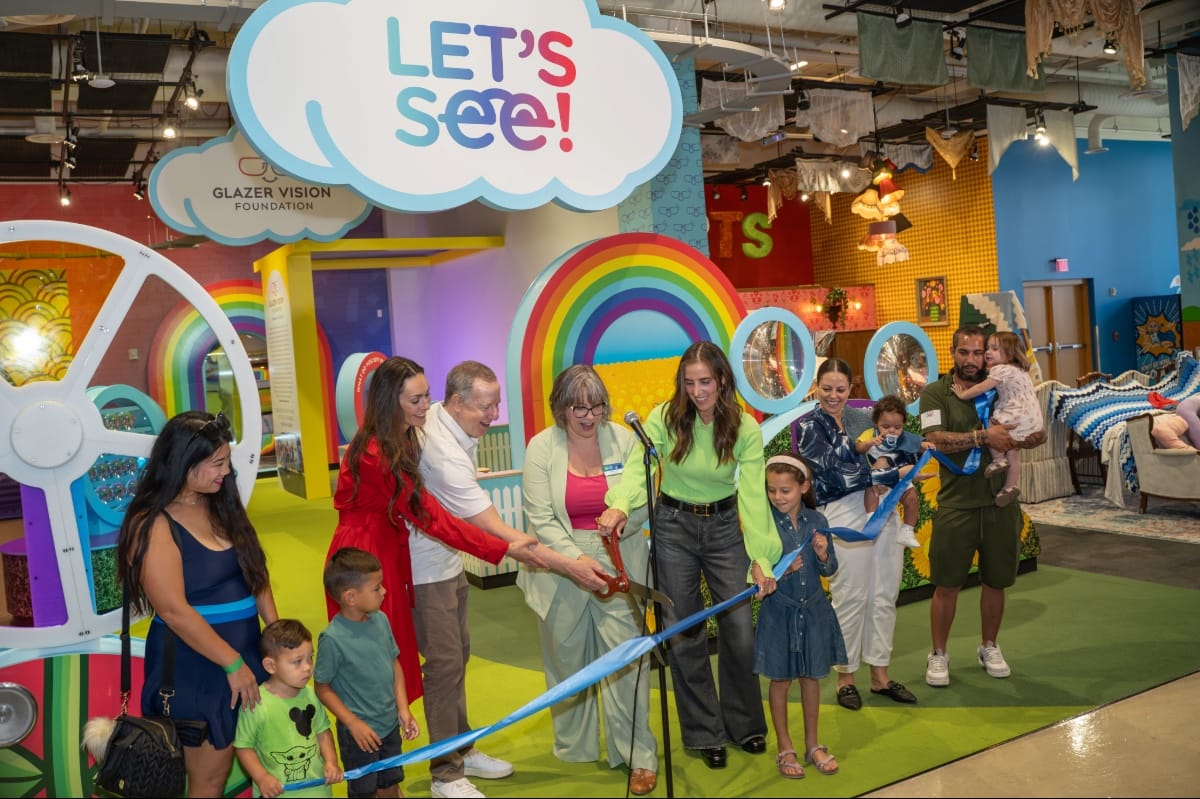 Let's See exhibit ribbon cutting Glazer family legacy of giving