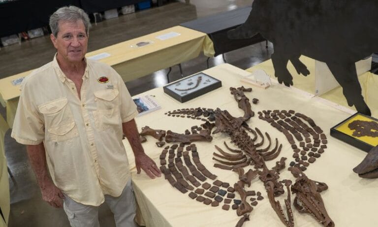 Dr. Bob Sinibaldi with the Armadillo fossil