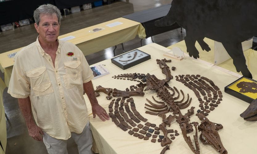 Dr. Bob Sinibaldi with the Armadillo fossil
