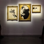 The Flower Thrower. The Art of Banksy exhibit. Photo by Kyle Flubacker.