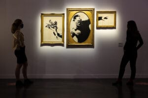 The Flower Thrower. The Art of Banksy exhibit. Photo by Kyle Flubacker.