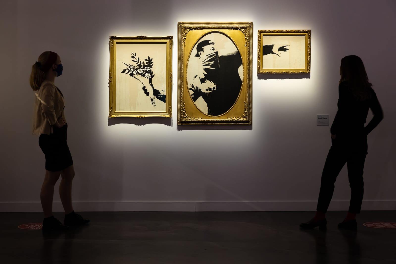 The Flower Thrower. The Art of Banksy exhibit. Photo by Kyle Flubacker.