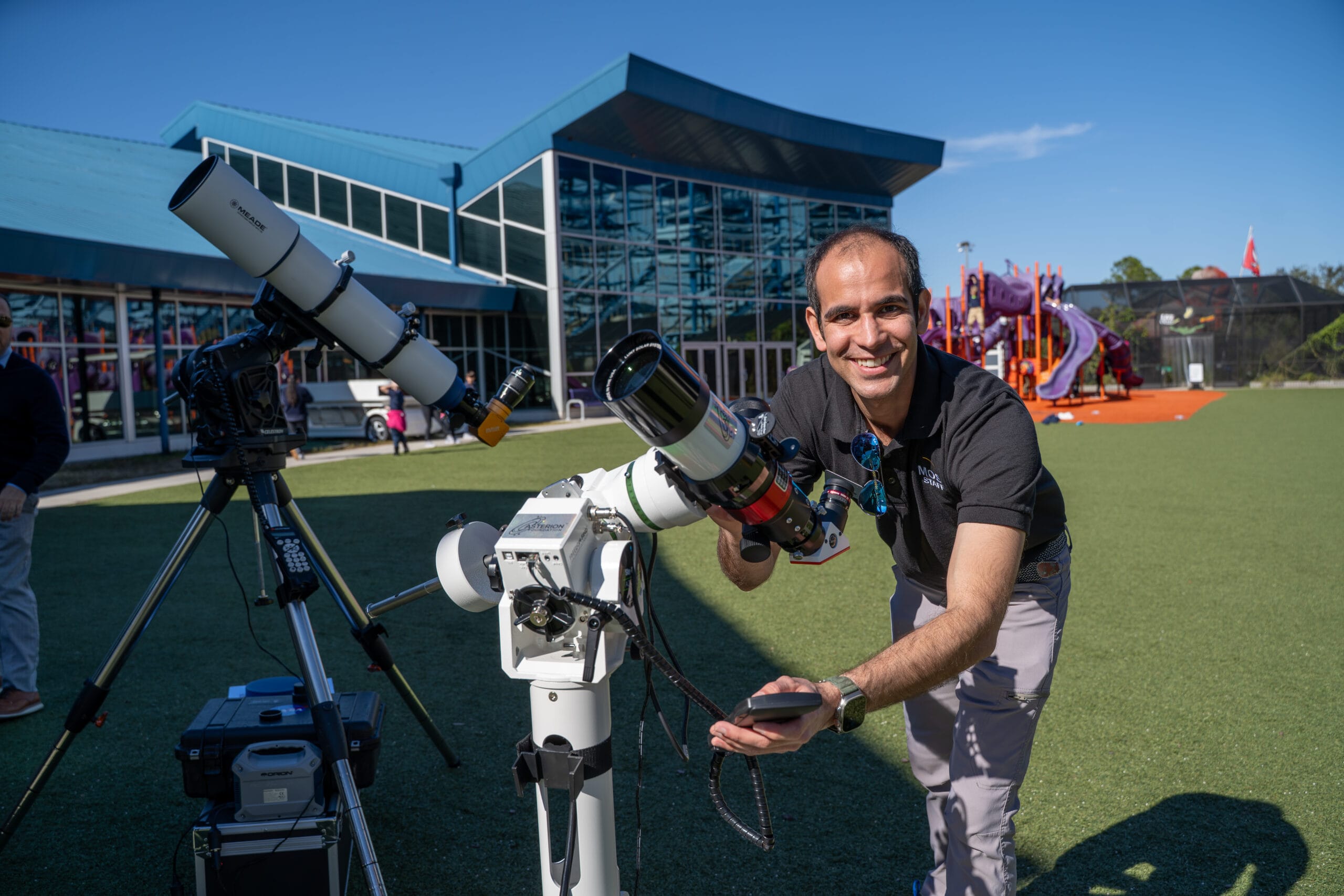 José Cotayo, MOSI's education specialist with a sun telescope