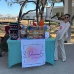A young girl showing off her booth at Tampa Bay Kids Market