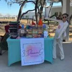 A young girl showing off her booth at Tampa Bay Kids Market