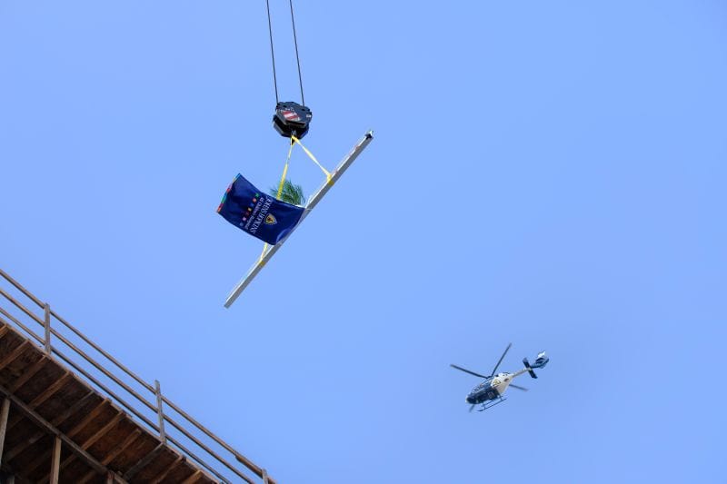 The final 2 beams are hoisted in the sky to the new Johns Hopkins All Children's Wesley Chapel Hospital