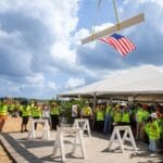 The American Flag is lifted with the final beam for the new Johns Hopkins All Children's Hospital Wesley Chapel