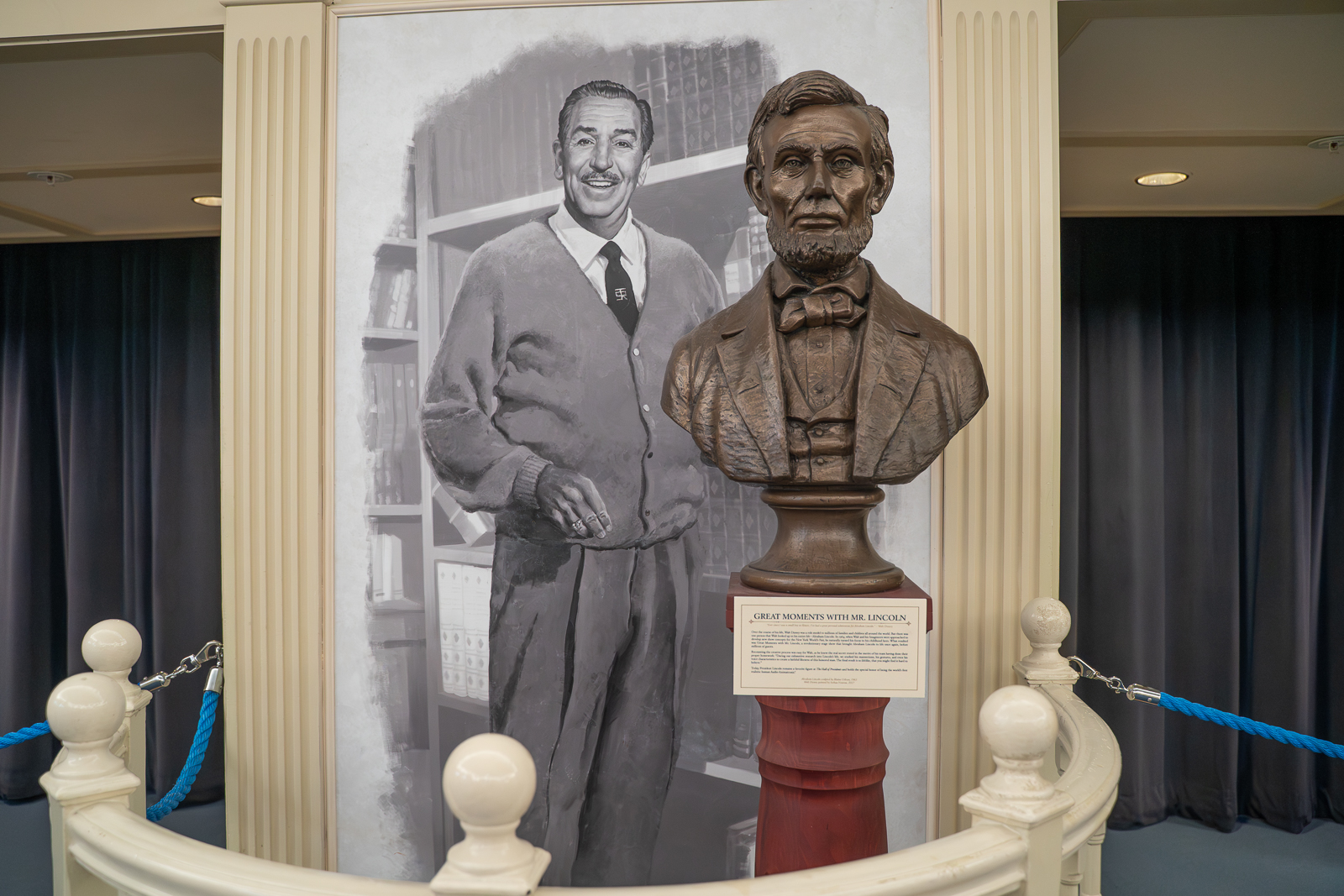 Painting of Walt Disney and a bust of Abraham Lincoln. Learn about American History at Liberty Square at Disney's Magic Kingdom
