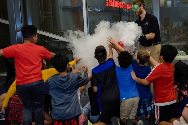 MOSI kids playing with smoke