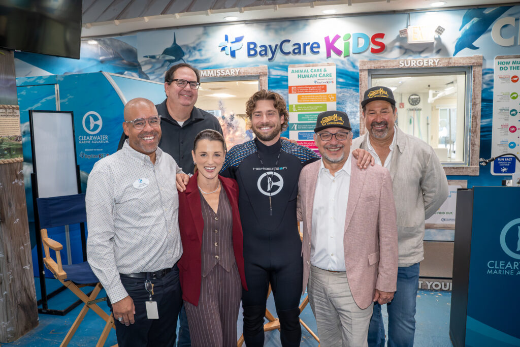 Clearwater Marine Aquarium CEO Joe Handy with the actors and Country Mile Entertainment owners. Photo by Laura Byrne.