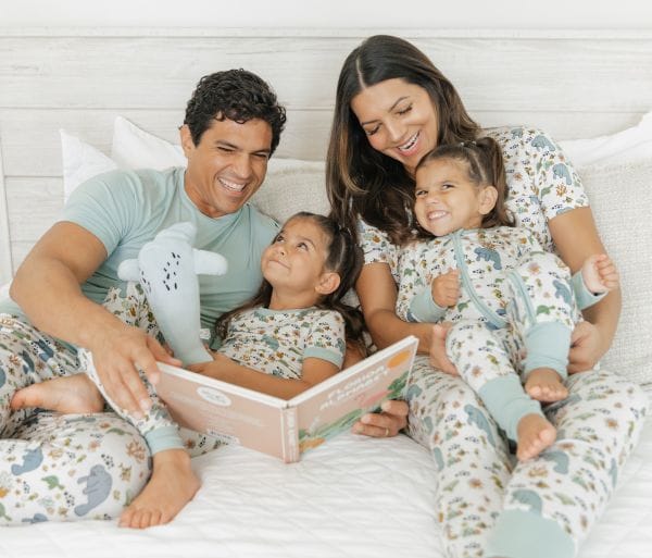 Emerson and Friends lifestyle image with Family reading in bed