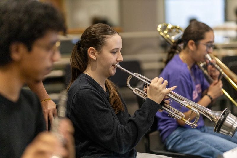 Ruth Eckerd Hall students playing trumpet instrument