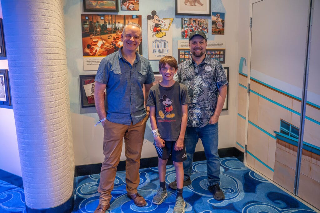 Magic of Disney Animation Dan Abraham and Danny Handke with child at The Magic of Disney Animation Dan Abraham and Danny Handke
