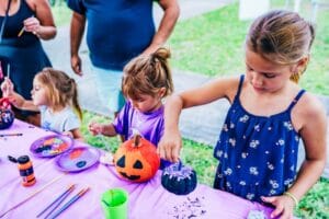 Watermelon Fall Fest Kids painting pumpkins