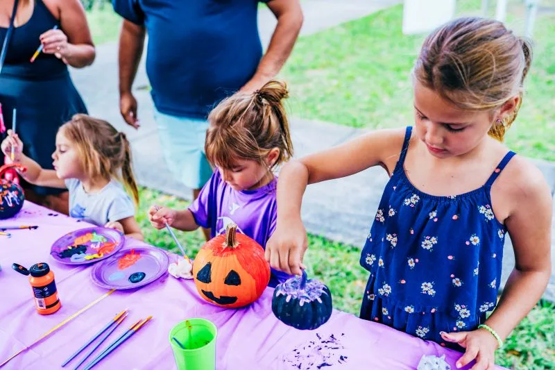 Watermelon Fall Fest Kids painting pumpkins