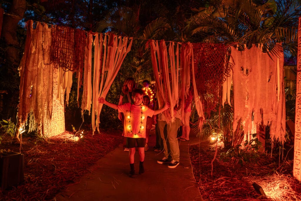ZooTampa Creatures of the Night Kids at Scared of the Dark trail boy going through trail